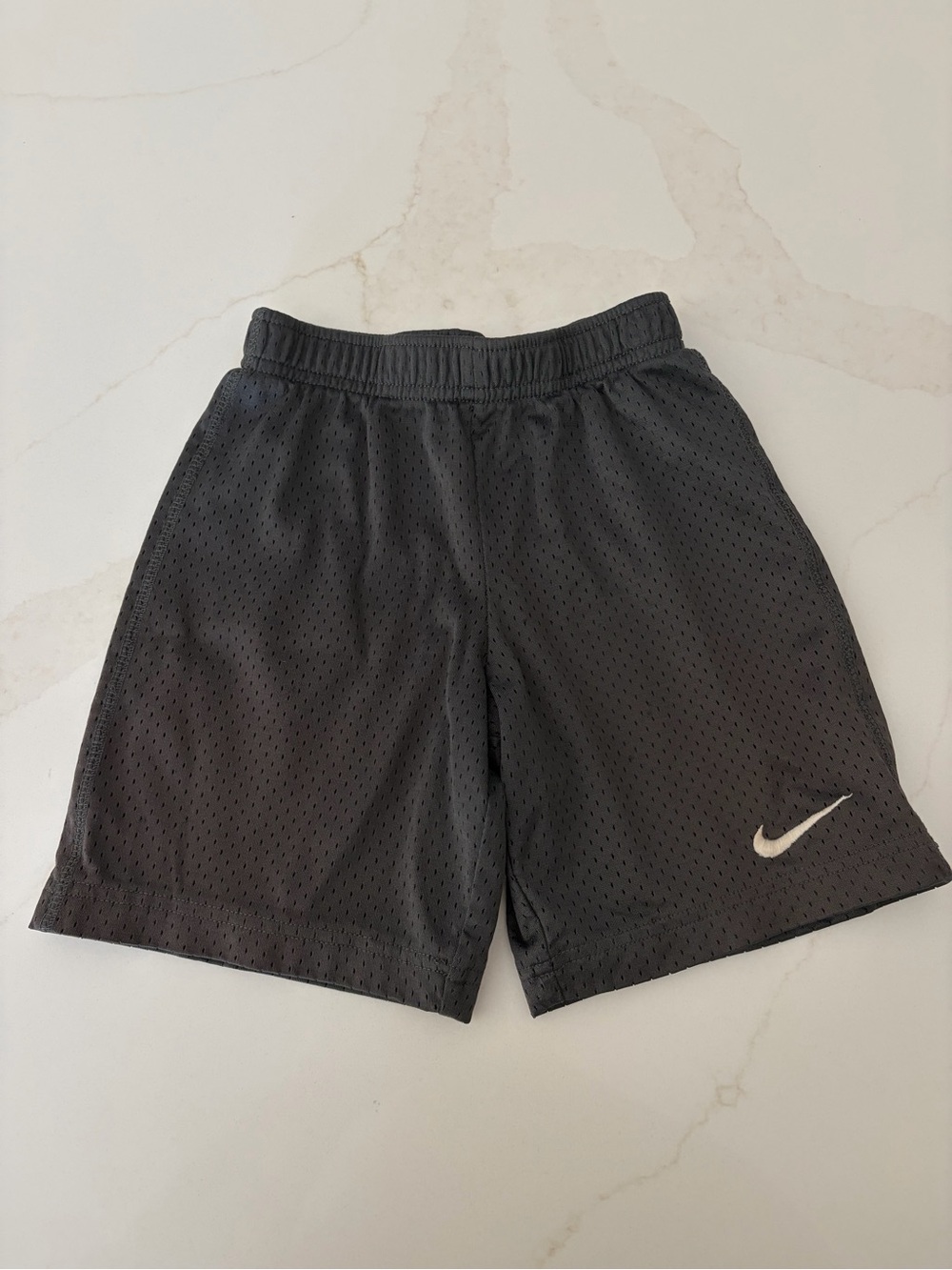 Nike Black Mesh Shorts with White Swoosh Logo